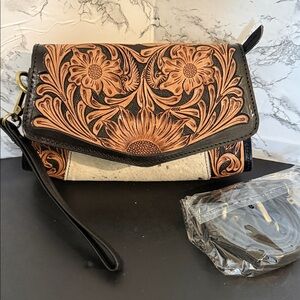 Floral Embossed Leather and Cowhide Wristlet with cross body strap